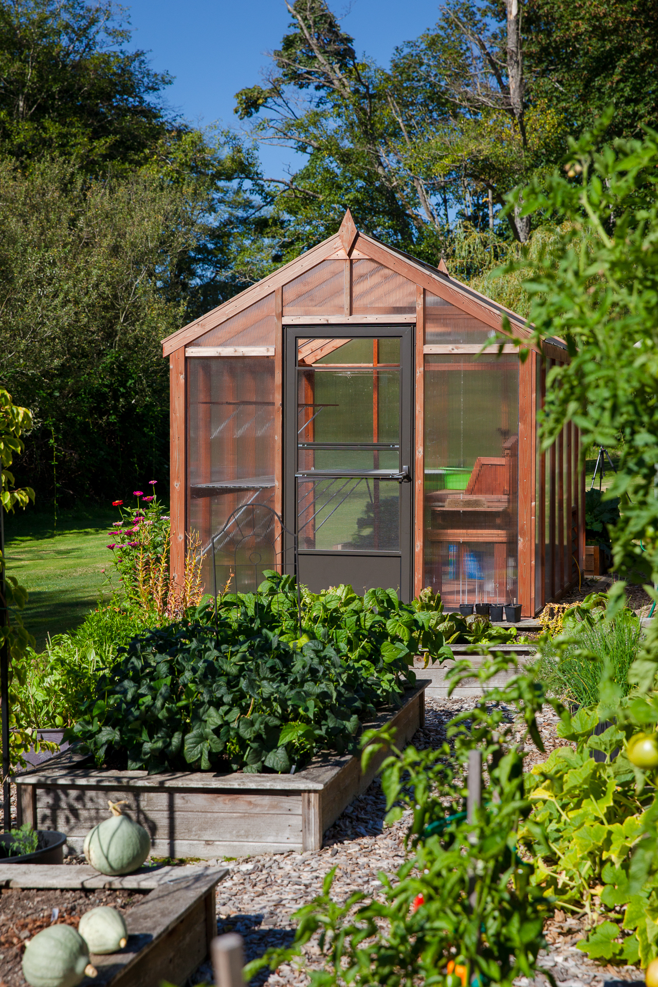 Charley's Cedar Heritage Greenhouse and summer vegetable garden