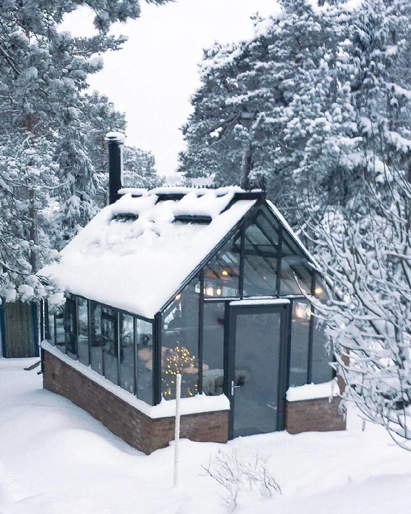 Cross Country Greenhouse Winter Sale - Greenhouse at holidays covered in snow